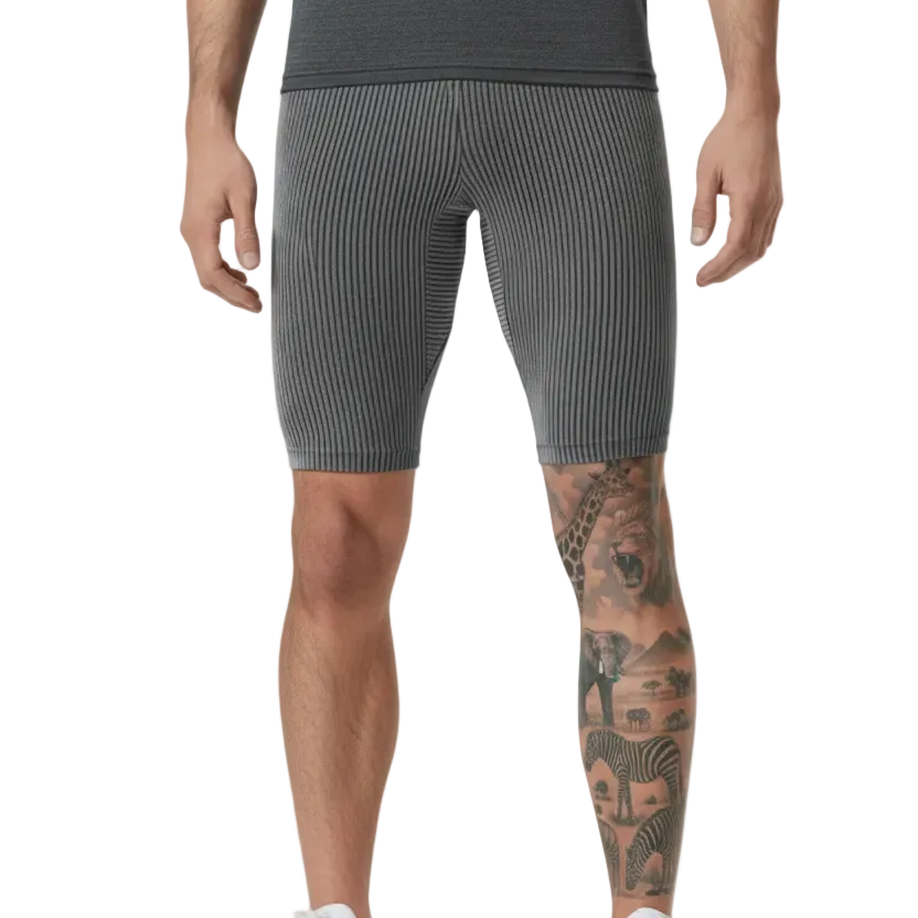 Person wearing AeroSkin Shorts, grey ribbed shorts for men designed for gym workouts, running, and active wear.