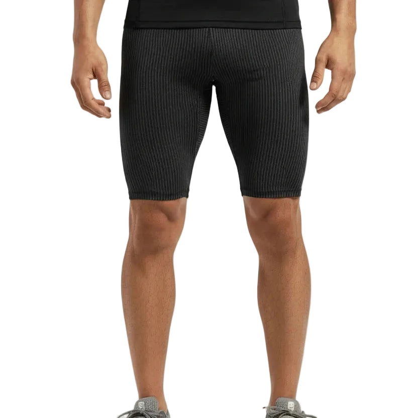 Person wearing black AeroSkin compression shorts for men built for gym training, running, and athletic performance.