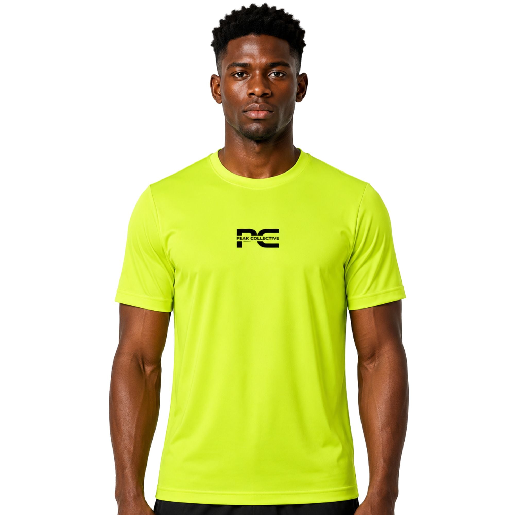 Male model wearing neon green AeroTee Sapphire short-sleeve performance shirt with logo on white background – lightweight men’s running top for gym workouts, training, jogging, and activewear performance