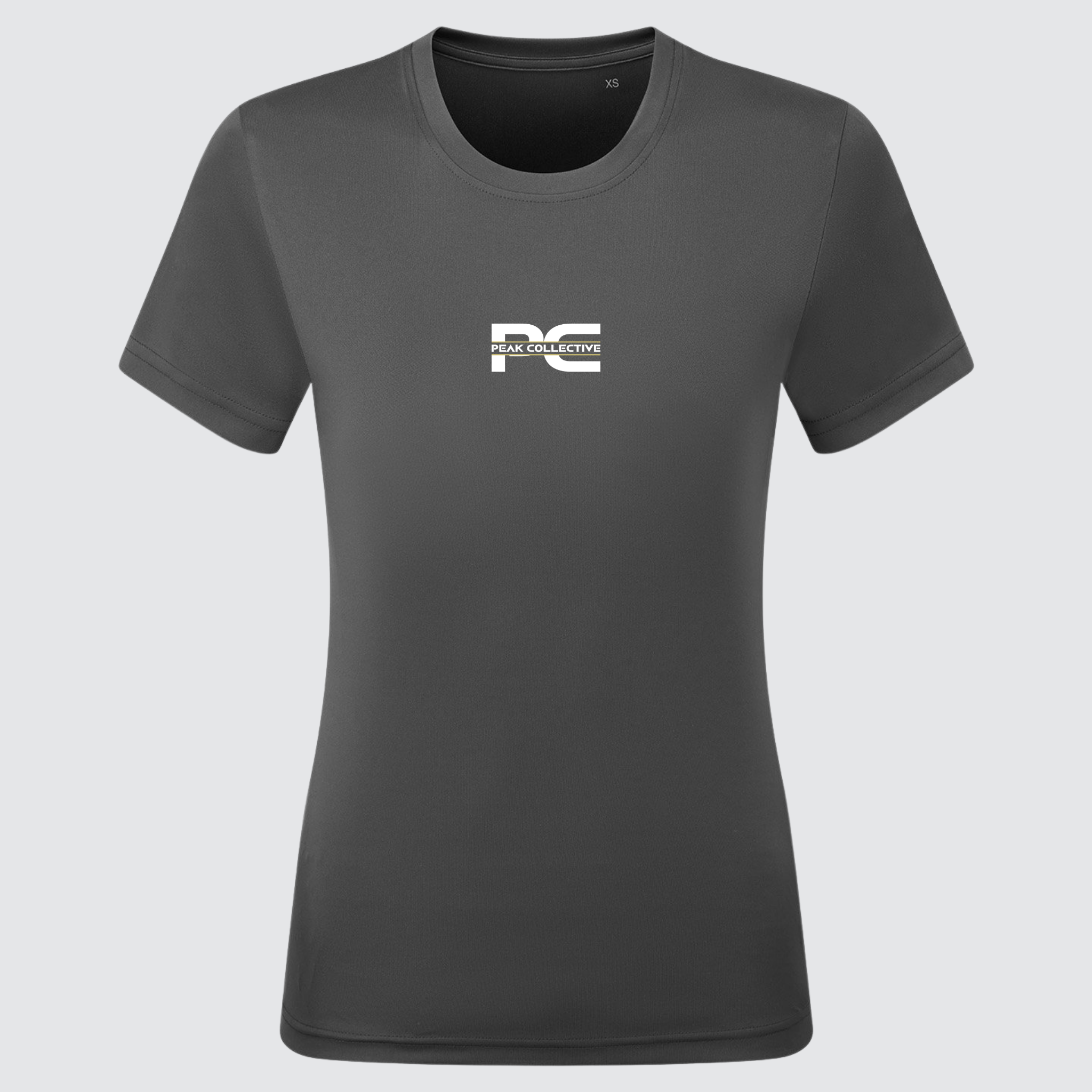 Women’s AuraTee short sleeve performance t-shirt in charcoal with logo, displayed on a light grey background, designed for running, training, and active workouts.