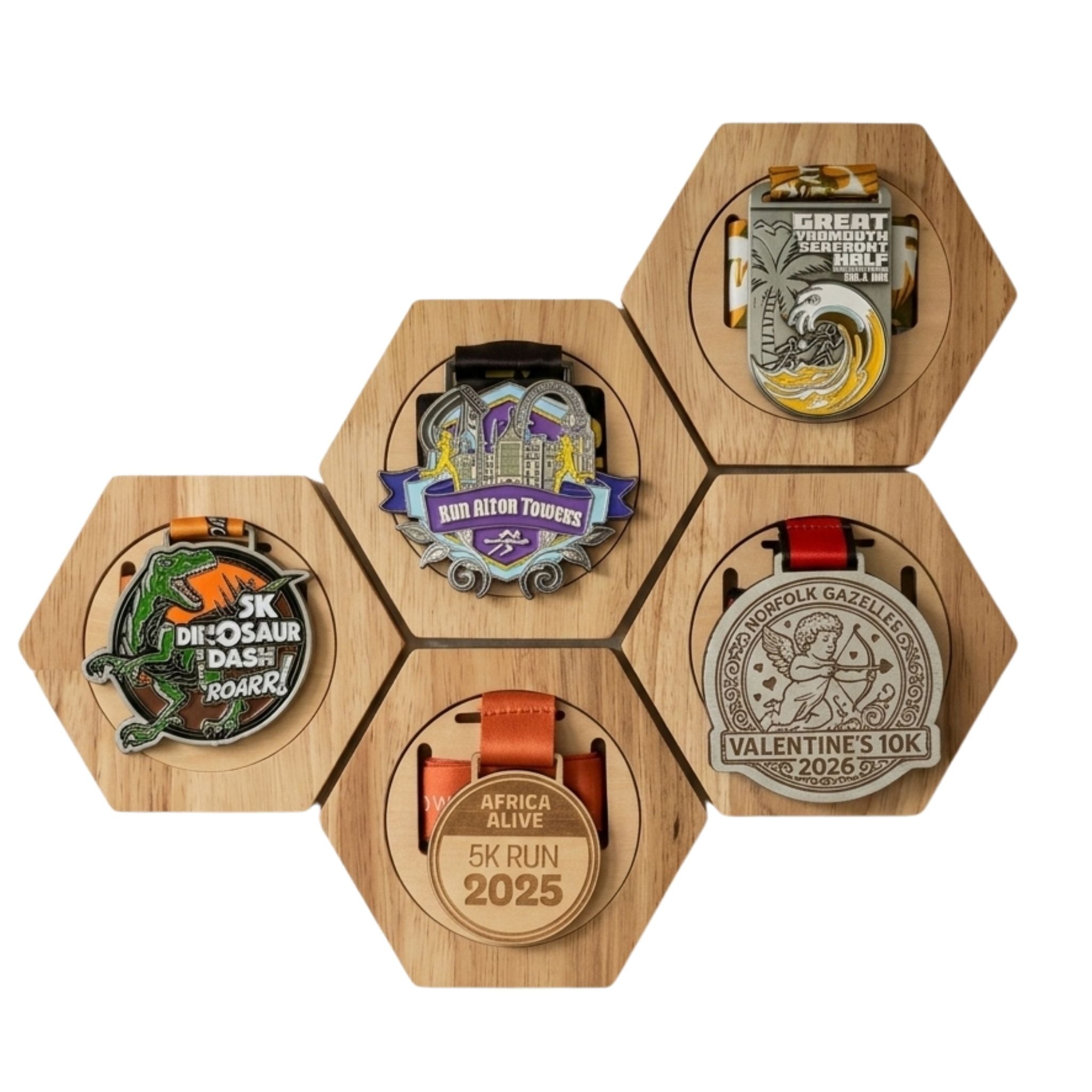 Collection of running medals displayed in PeakMedal wooden hexagonal medal holders on a grey background, perfect for athletes to showcase achievements.