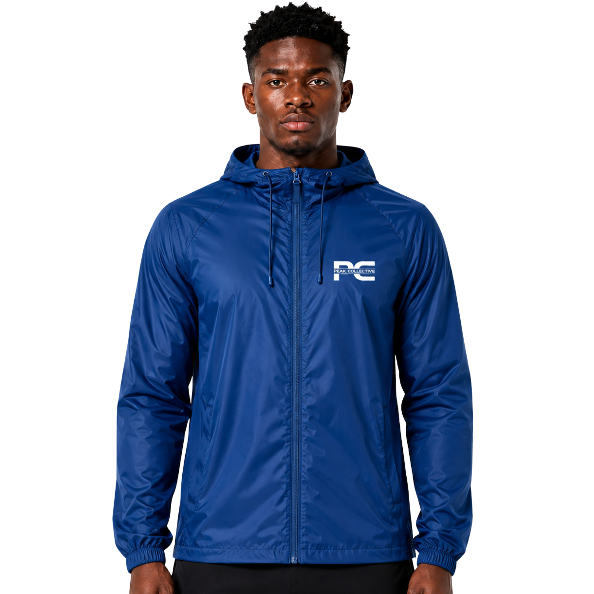 Model wearing Royal Blue AerisShell lightweight performance windbreaker jacket with visible brand logo on grey background – breathable activewear layer for running, outdoor training, workouts, and everyday movement