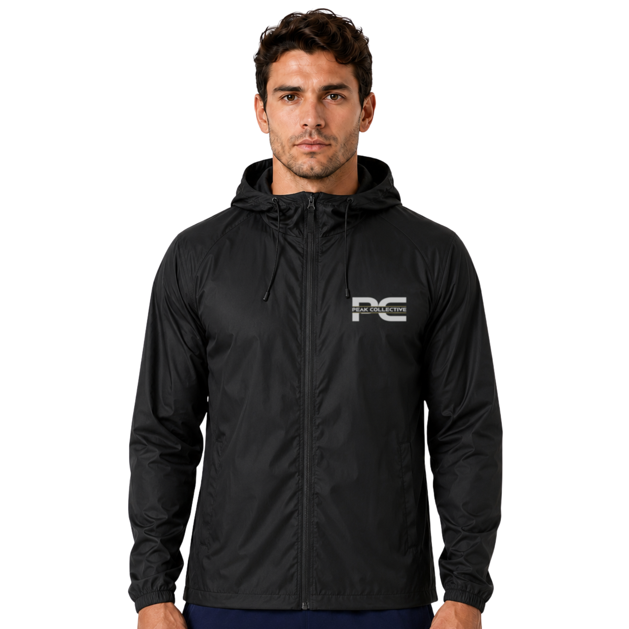 Model wearing black AerisShell lightweight performance windbreaker jacket with visible brand logo on grey background – breathable activewear layer for running, outdoor training, workouts, and everyday movement