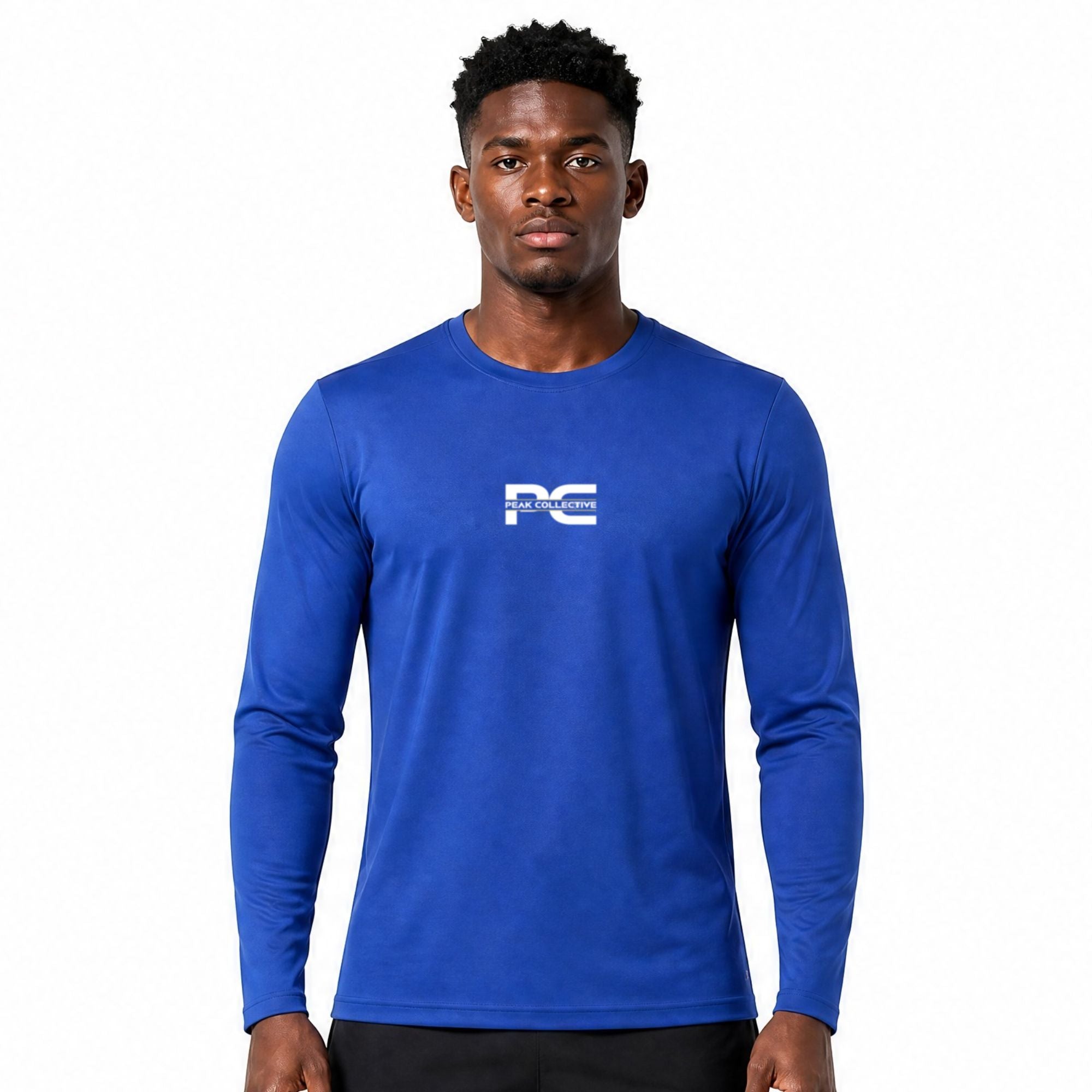Male model wearing royal blue AeroSleeve long-sleeve performance top - breathable men’s running shirt for training, gym workouts, jogging, and active performance wear