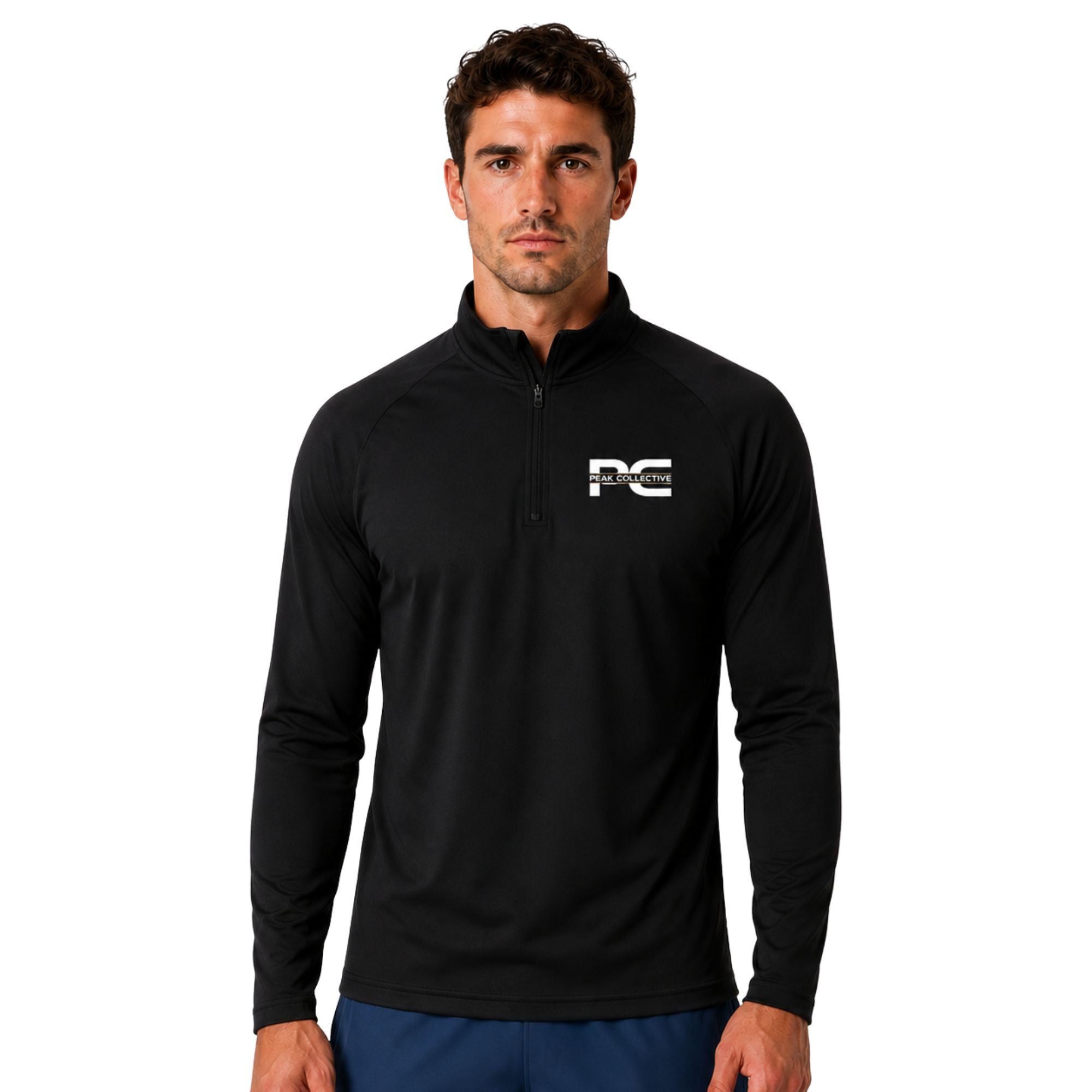 Male model wearing Black/black AeroZip long-sleeve athletic top with red quarter zip on white background – lightweight men’s running layer for training, gym workouts, jogging, and activewear performance
