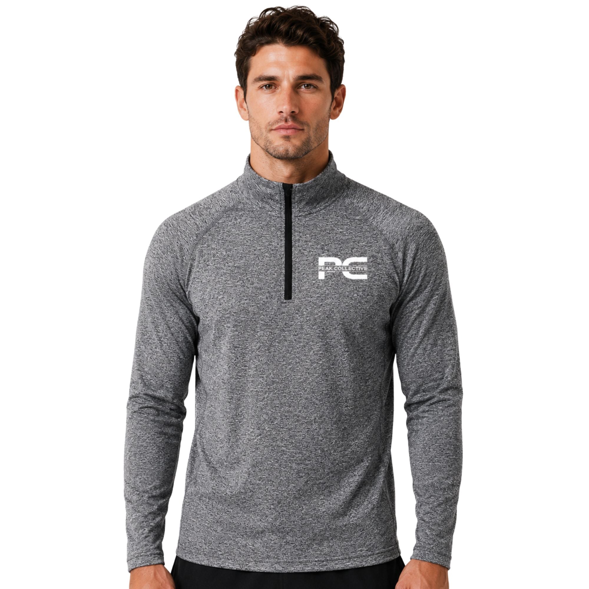 Male model wearing grey AeroZip long-sleeve athletic top with red quarter zip on white background – lightweight men’s running layer for training, gym workouts, jogging, and activewear performance