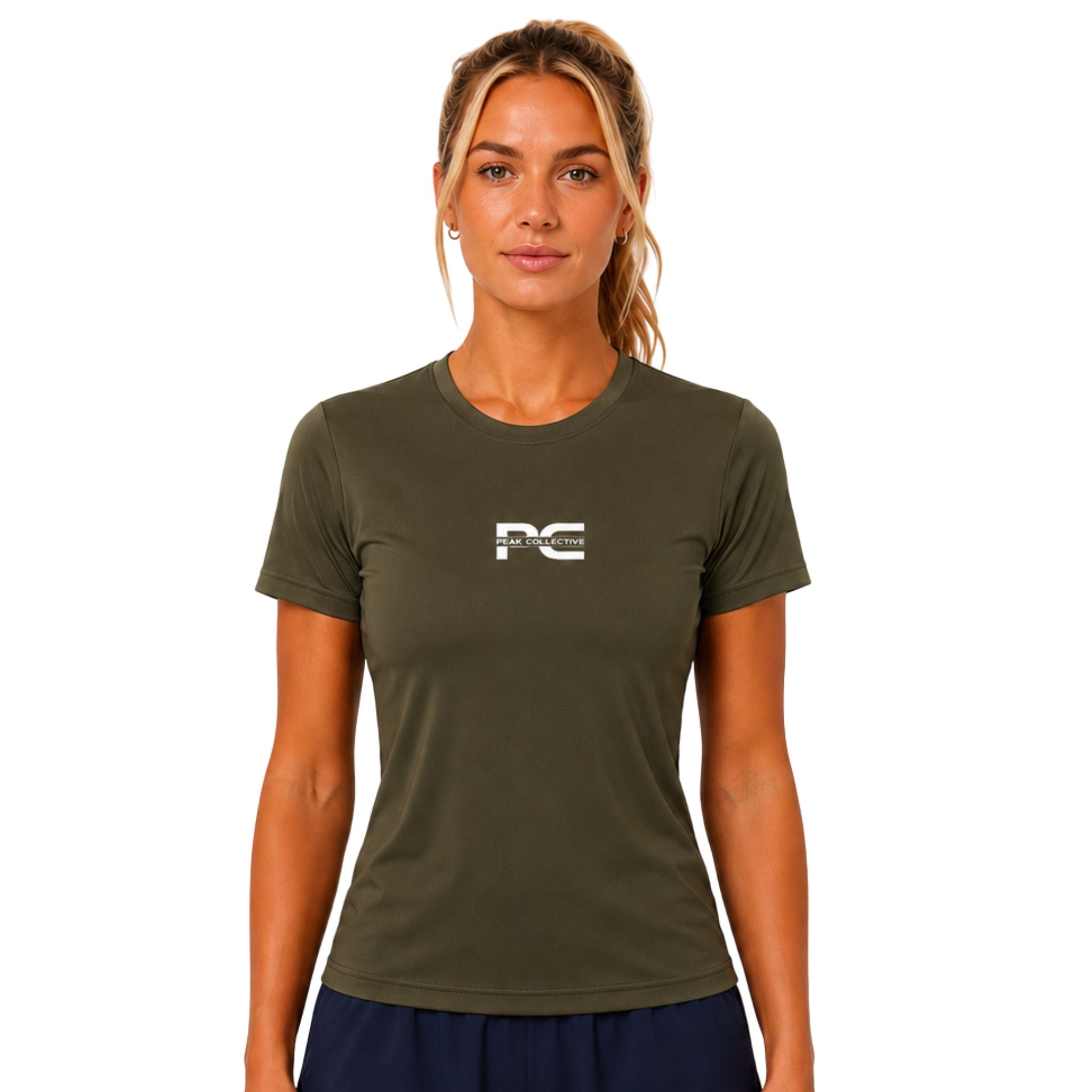 Woman wearing khaki AuraTee athletic performance shirt with logo on white background – lightweight women’s running top for gym workouts, training, jogging, and everyday activewear