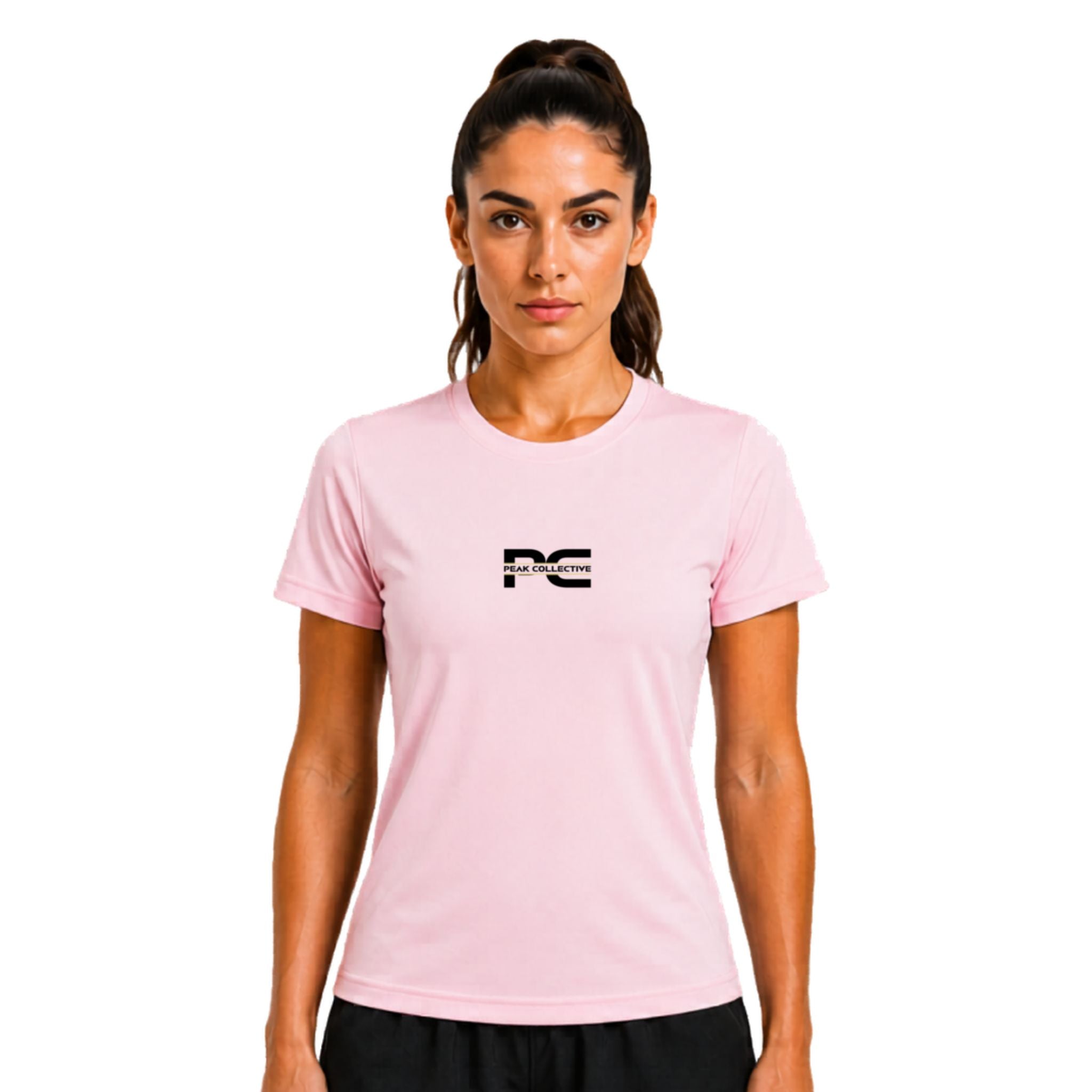 Woman wearing light pink AuraTee athletic performance shirt with logo on white background – lightweight women’s running top for gym workouts, training, jogging, and everyday activewear