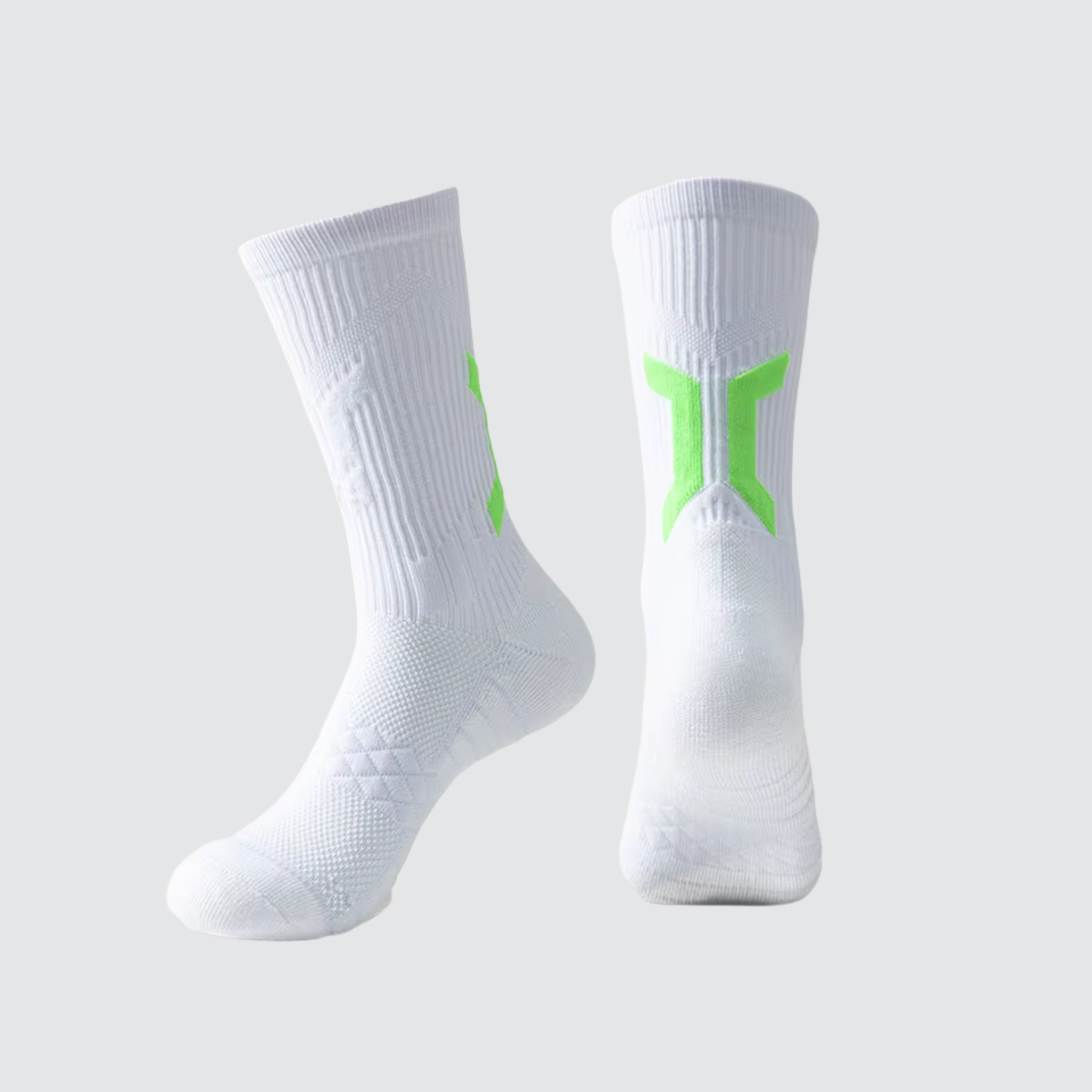 Pair of CoreSteppers athletic socks in Glacier displayed on a light grey background, designed for performance comfort and support.