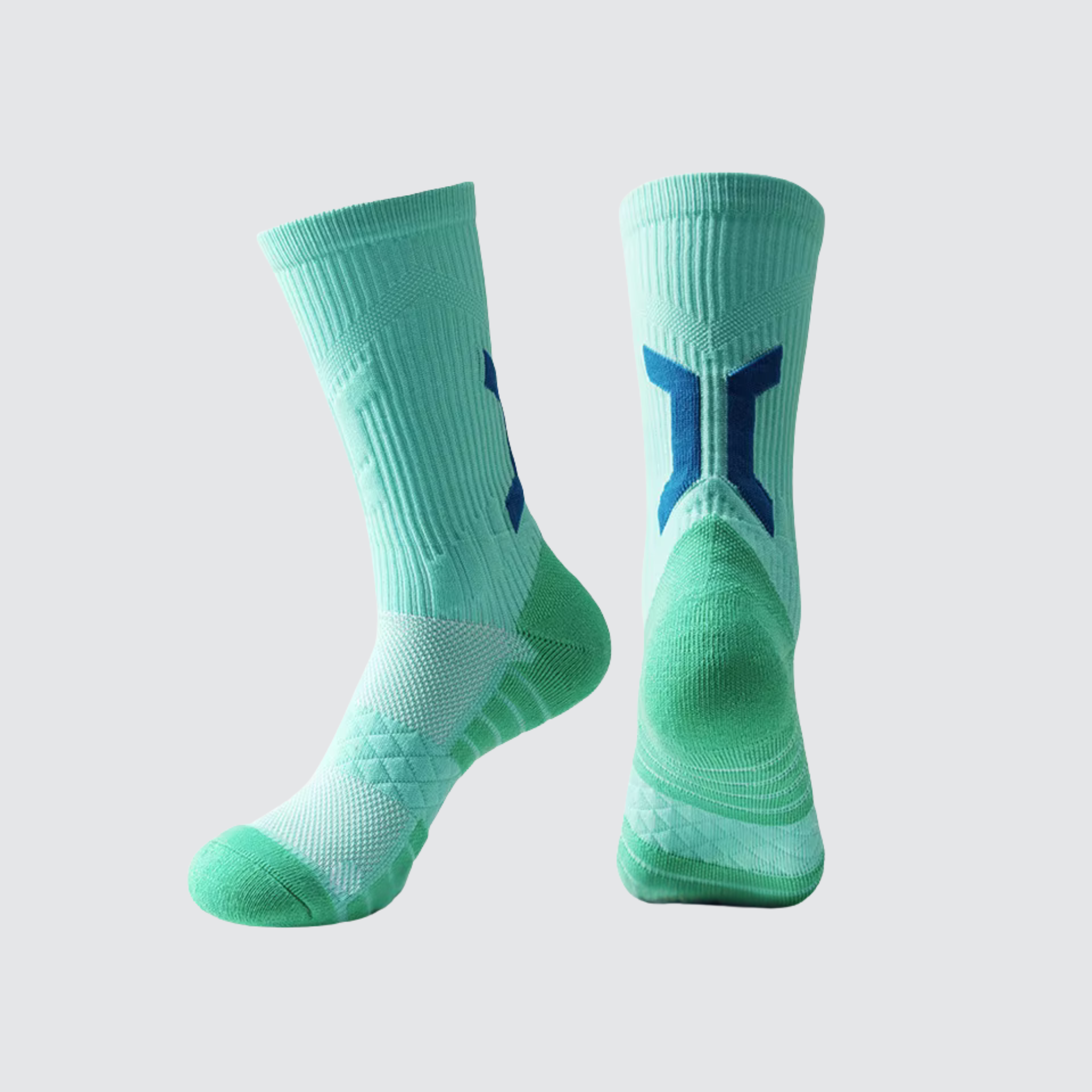 Pair of CoreSteppers athletic socks in Momentum Green displayed on a light grey background, designed for performance comfort and support.