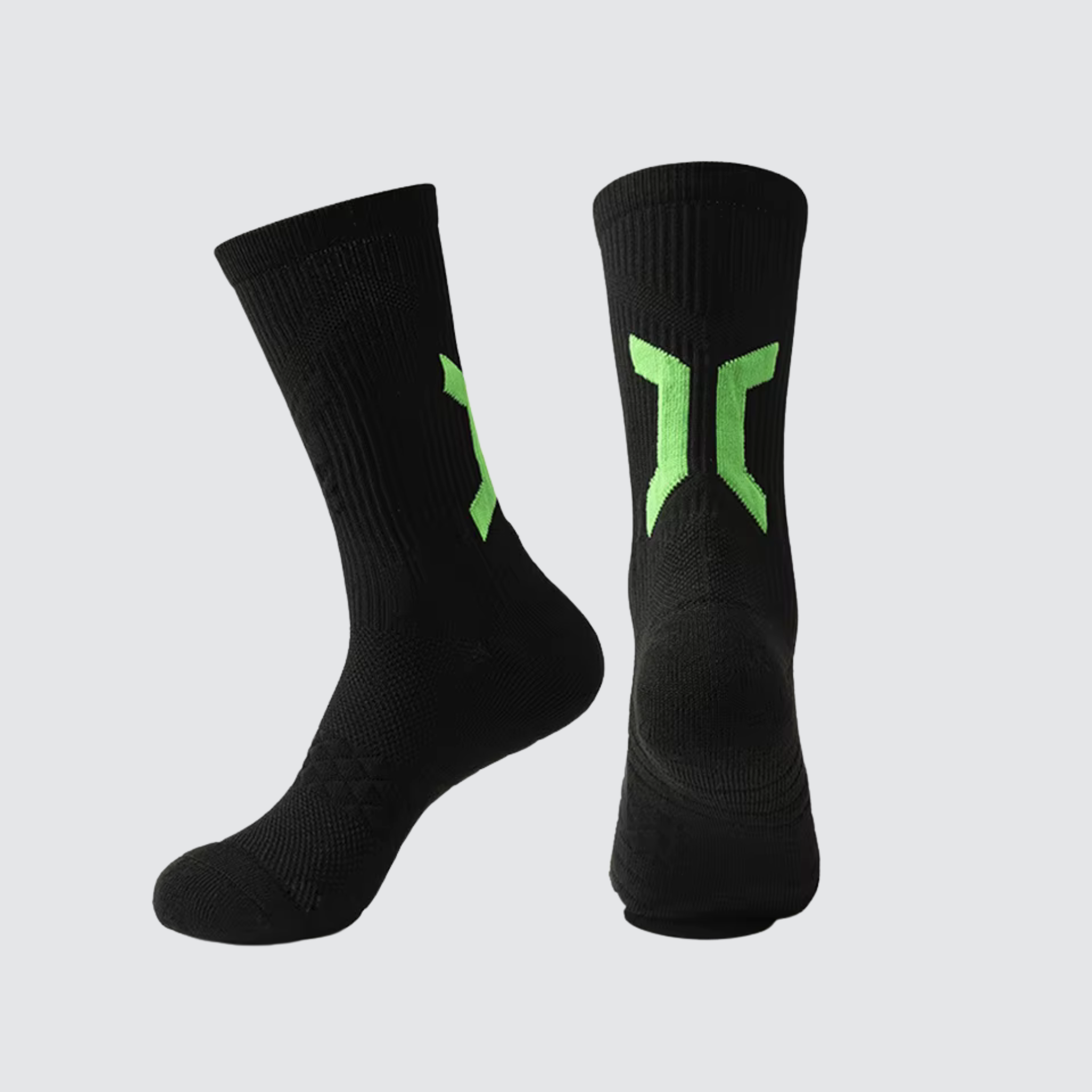 Pair of CoreSteppers athletic socks in Obsidian displayed on a light grey background, designed for performance comfort and support.