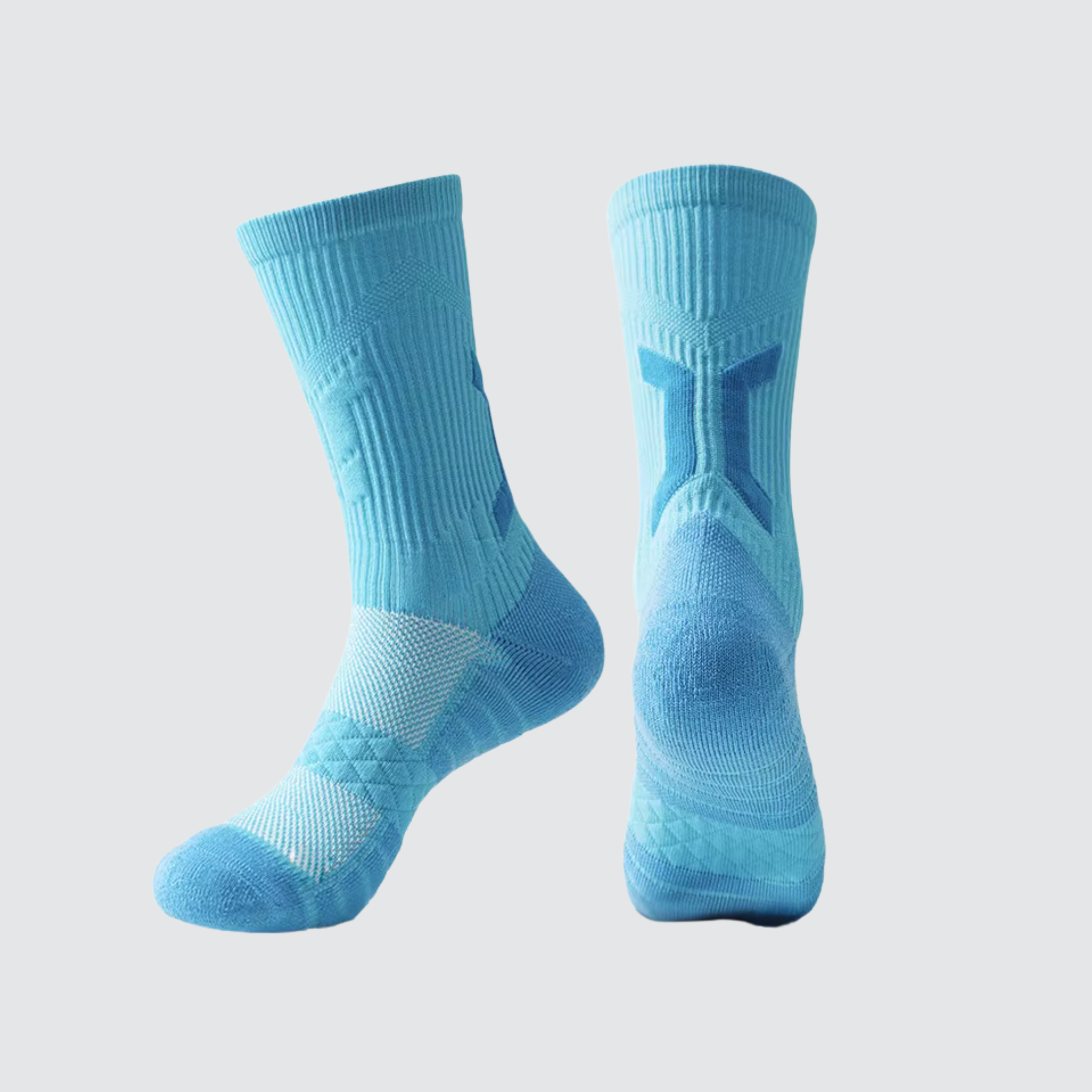 Pair of CoreSteppers athletic socks in Velocity Blue displayed on a light grey background, designed for performance comfort and support.
