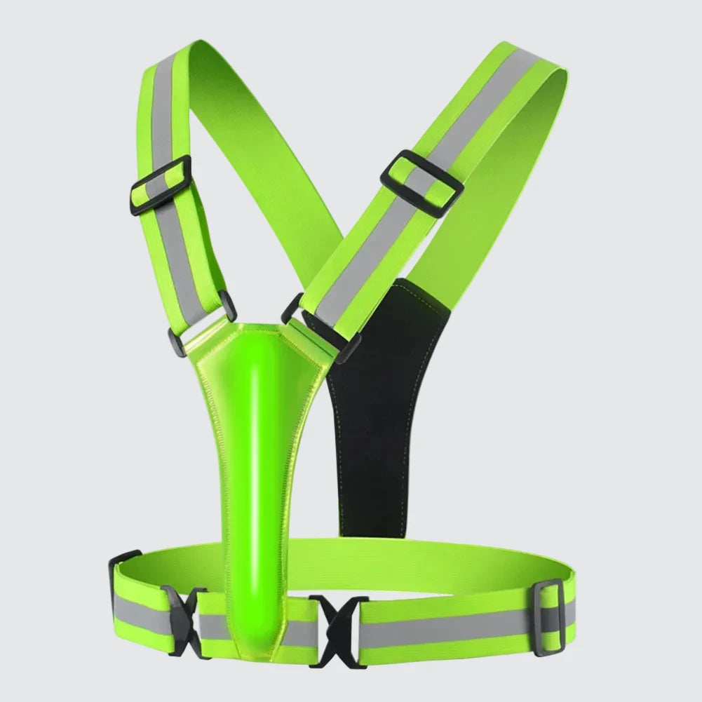 Green HaloVest running harness with reflective strips, ideal for runners during low-light, nighttime, or early morning workouts, shown on a white background.