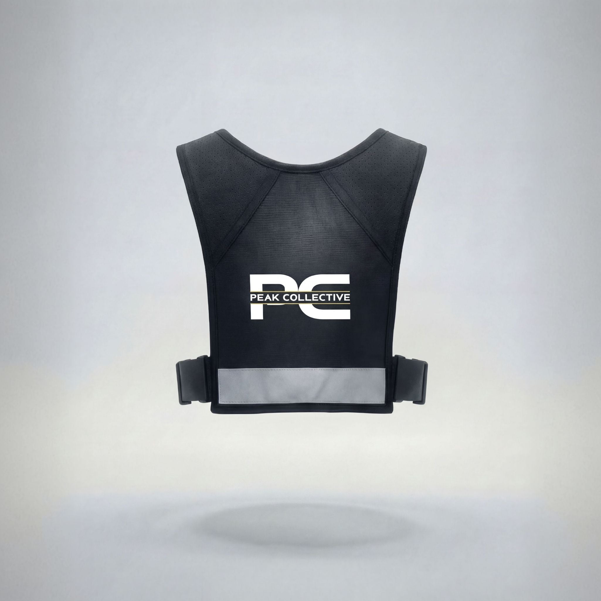 Back view of MagnaVest showing reflective strip and ergonomic design, highlighting safety features for running, cycling, and active workouts, on light grey background