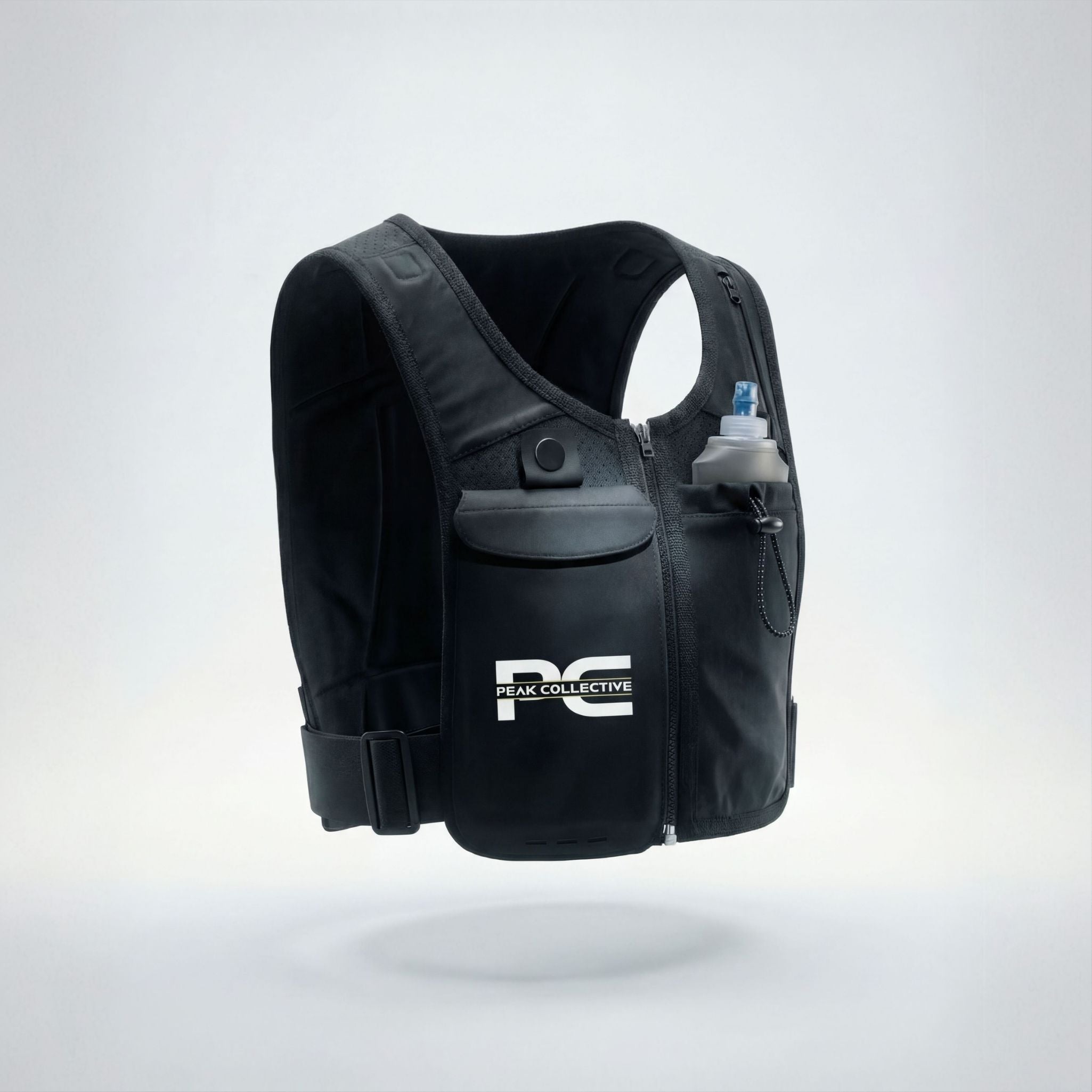 MagnaVest running hydration vest with PeakHydra soft flex bottle featuring Peak Collective logo, displayed on a light grey background, ideal for running and active workouts.