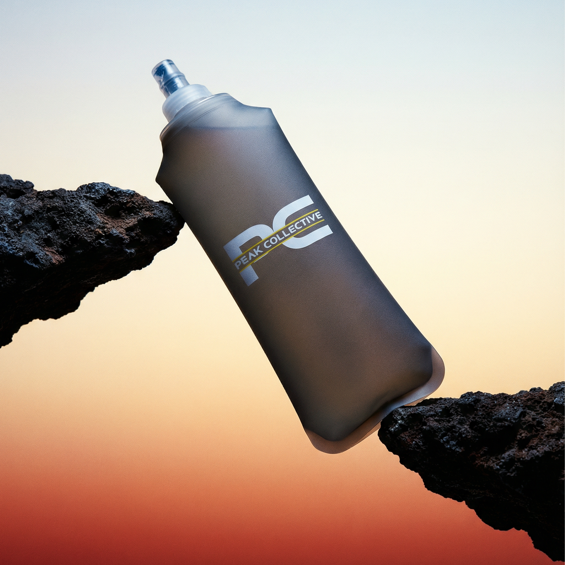 PeakHydra Soft Flex running bottle for hydration in running, gym and outdoor activities rested between two rocks