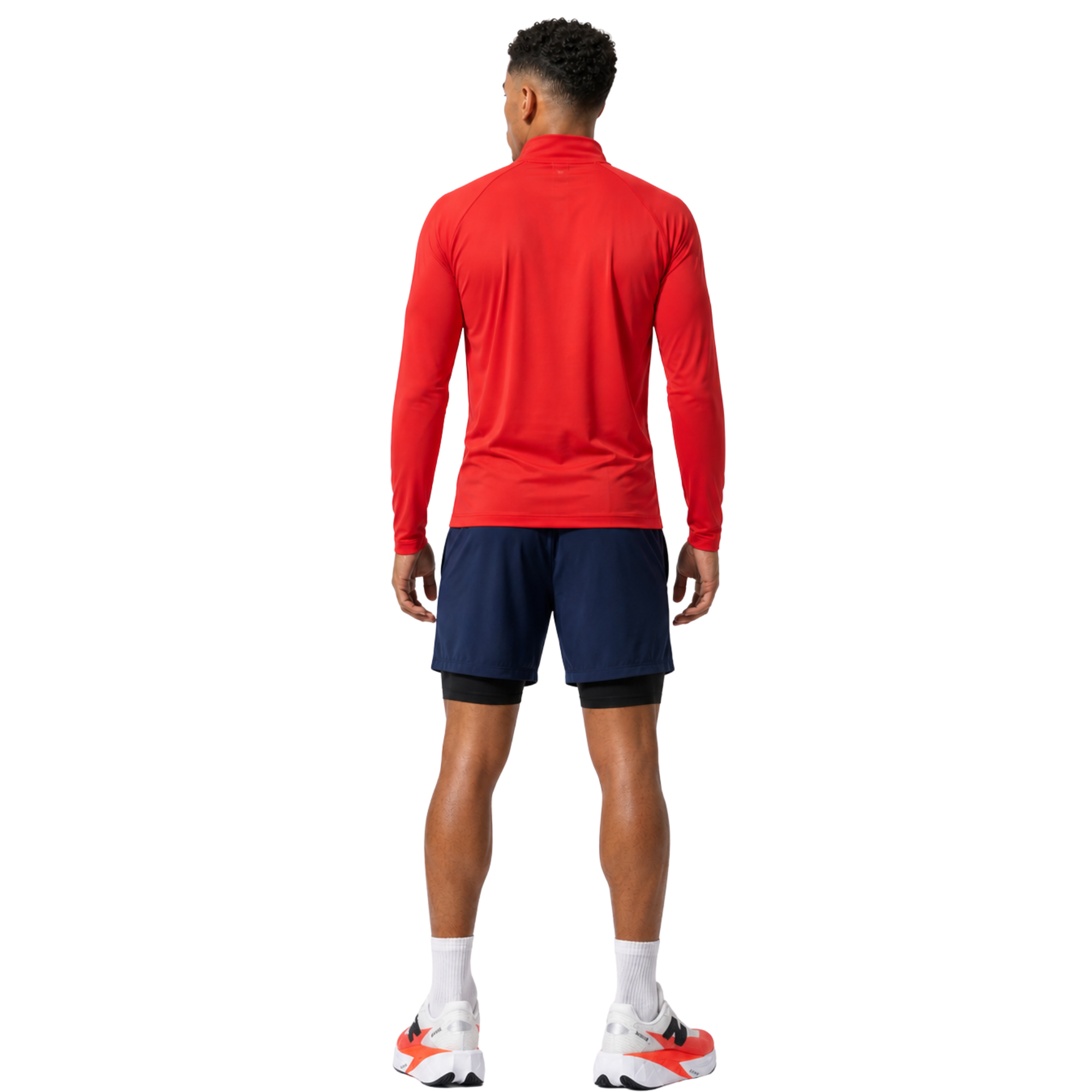 Man wearing navy CoreStrides double-layer athletic shorts with built-in undershorts and logo on white background – lightweight men’s running shorts for gym workouts, training, jogging, and everyday activewear performance